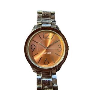 Nine West Women's Silver-Tone Bracelet Watch with Copper Sunburst Dial Quartz
